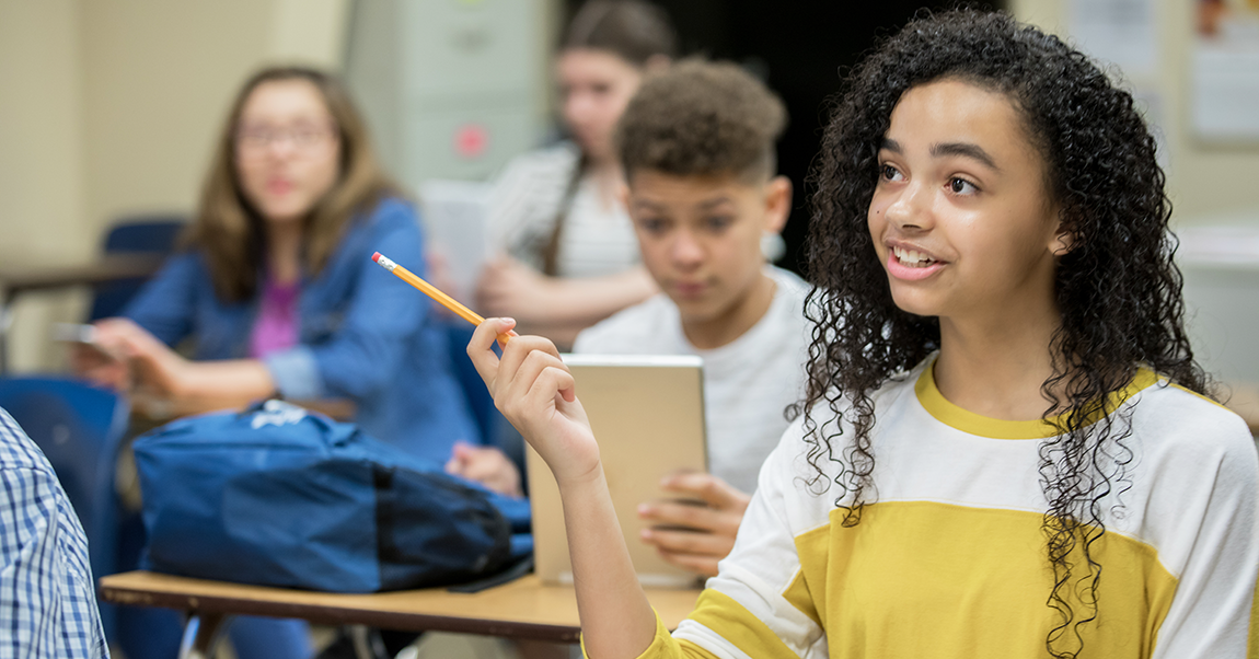 student responding in a classroom discussion