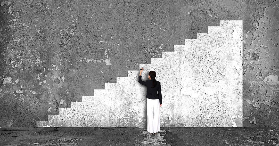 chalk drawing of stairs on a gray wall