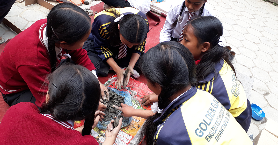 Students from Nepal working on a project