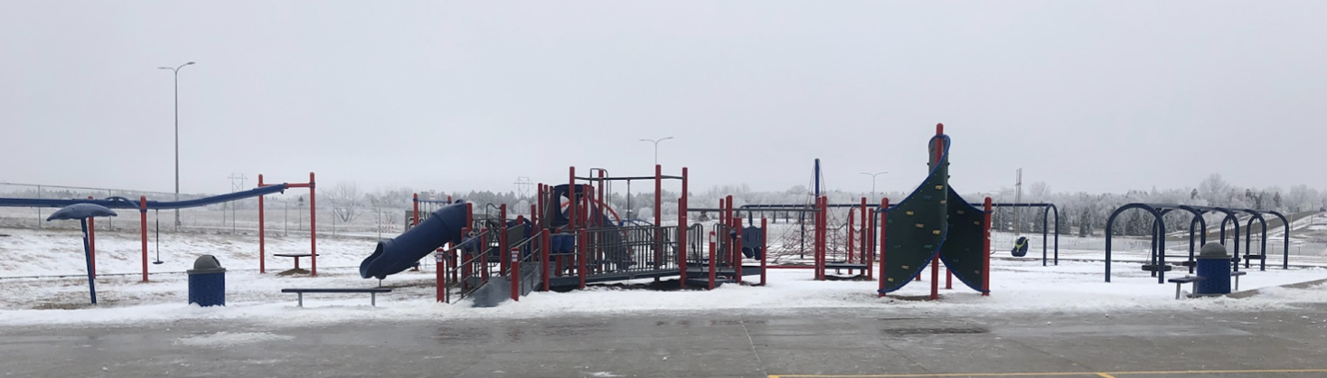 playground covered in snow