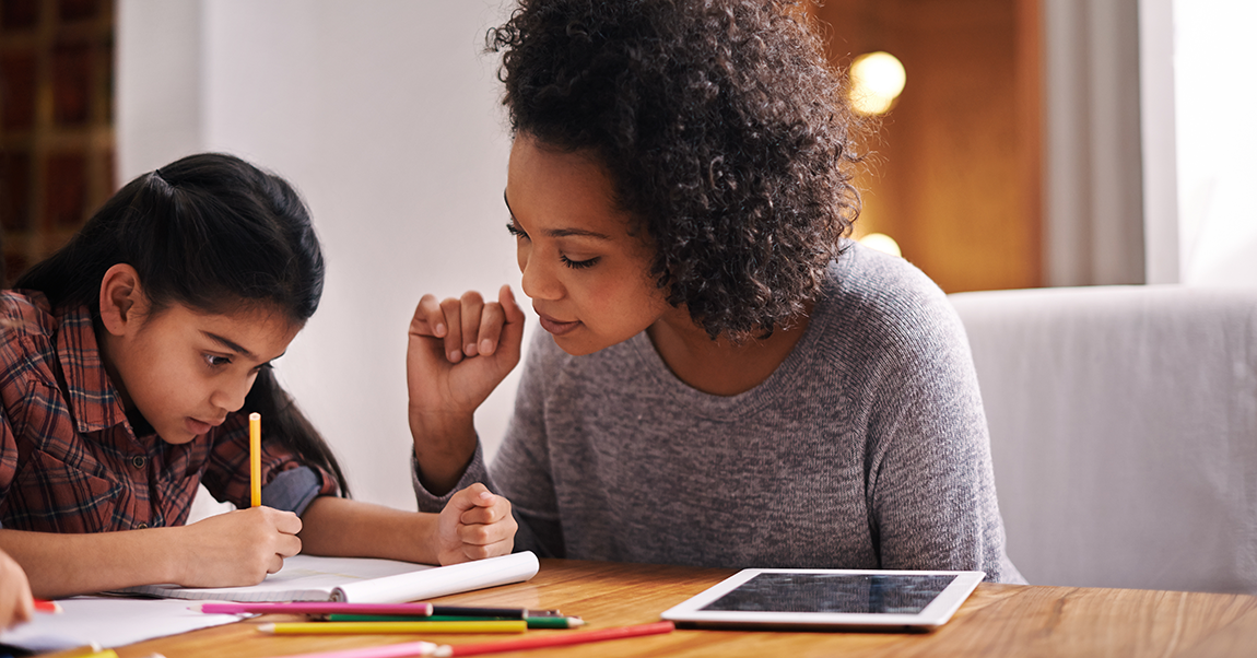 Parent helping her child manage her PBL work