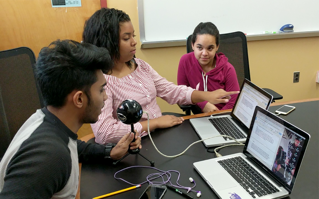 student working on their podcast
