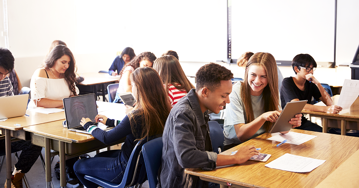 students in the class work at stations