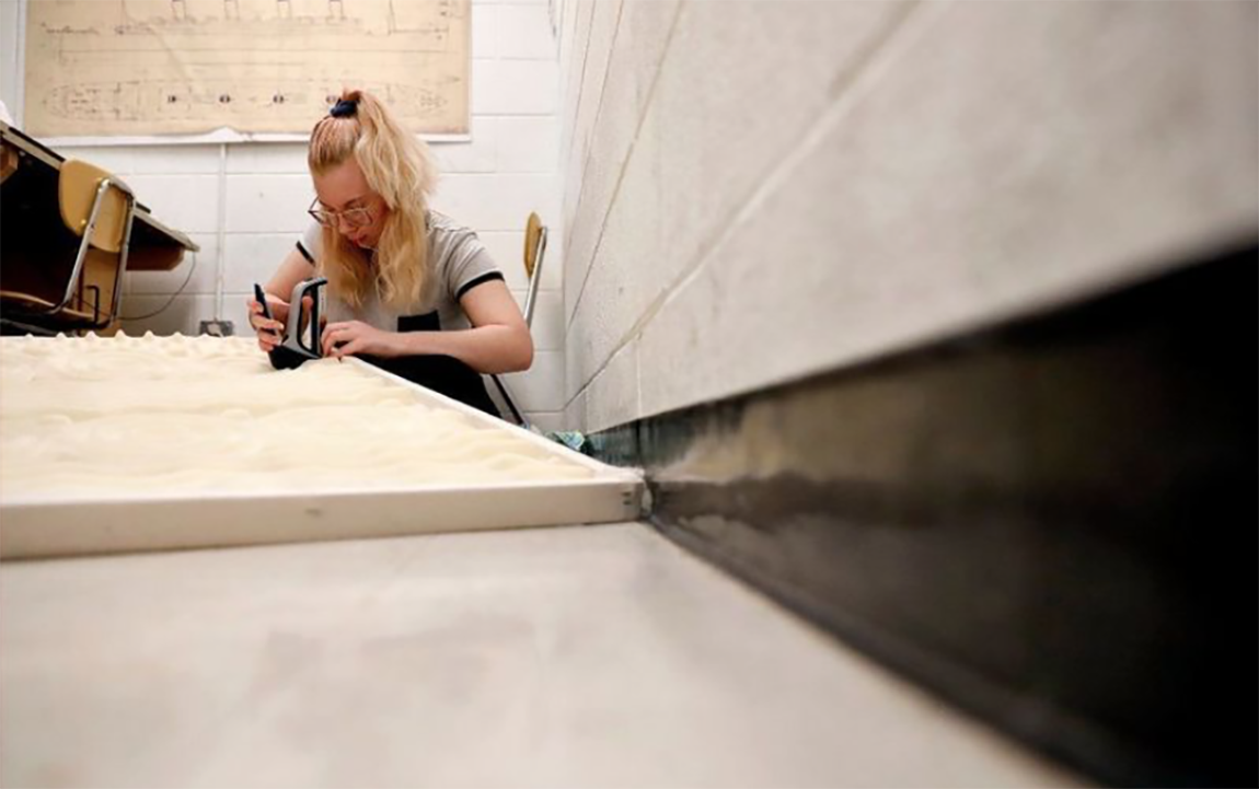 student working on an acoustic project