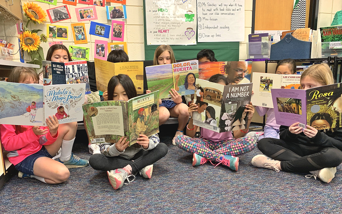 students in a PBL classroom reading