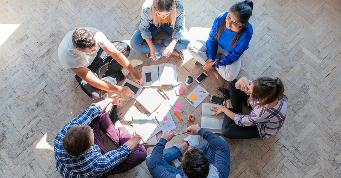 students providing feedback in a circle 