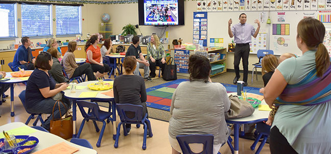 parents in a student classroom Jumping In and learning more