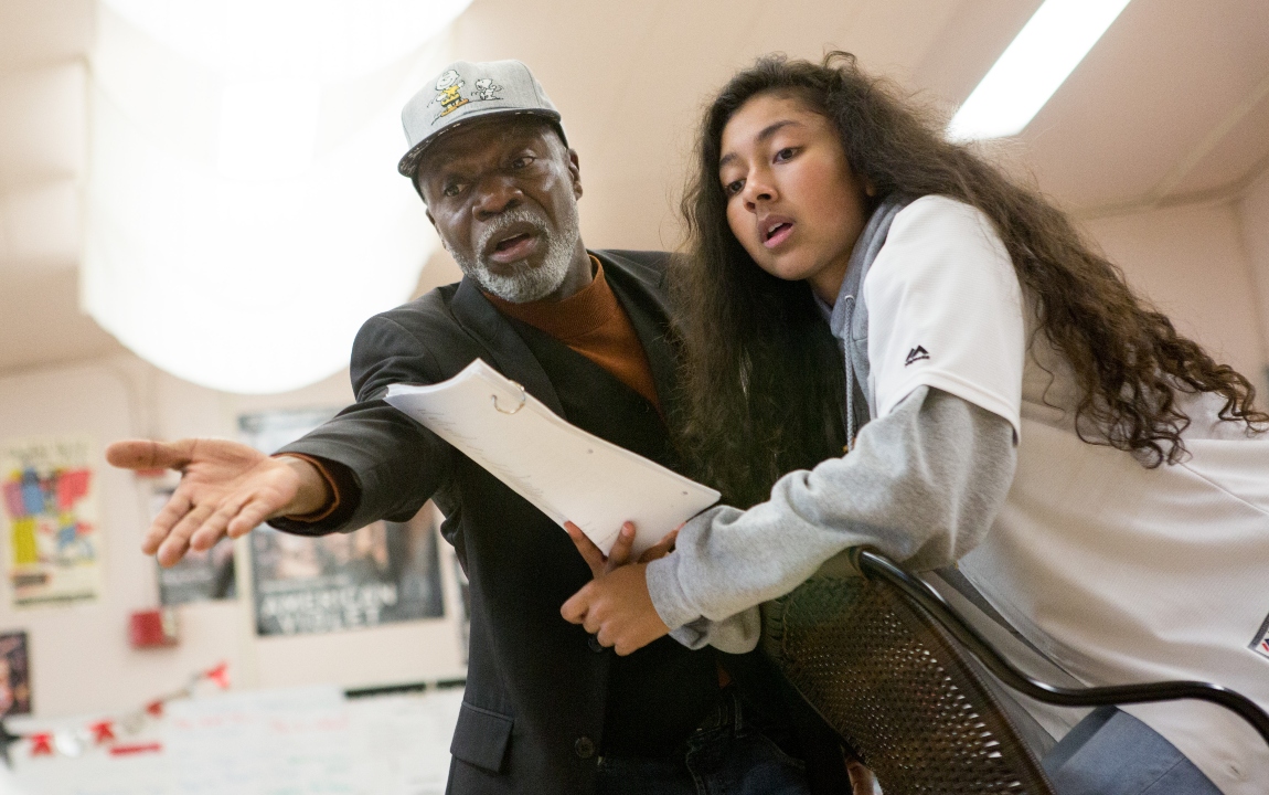 Teacher helping a student