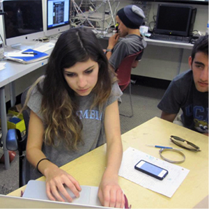 student working on a project in a classroom 