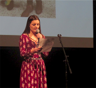 photo of a female student presenting for her PBL project