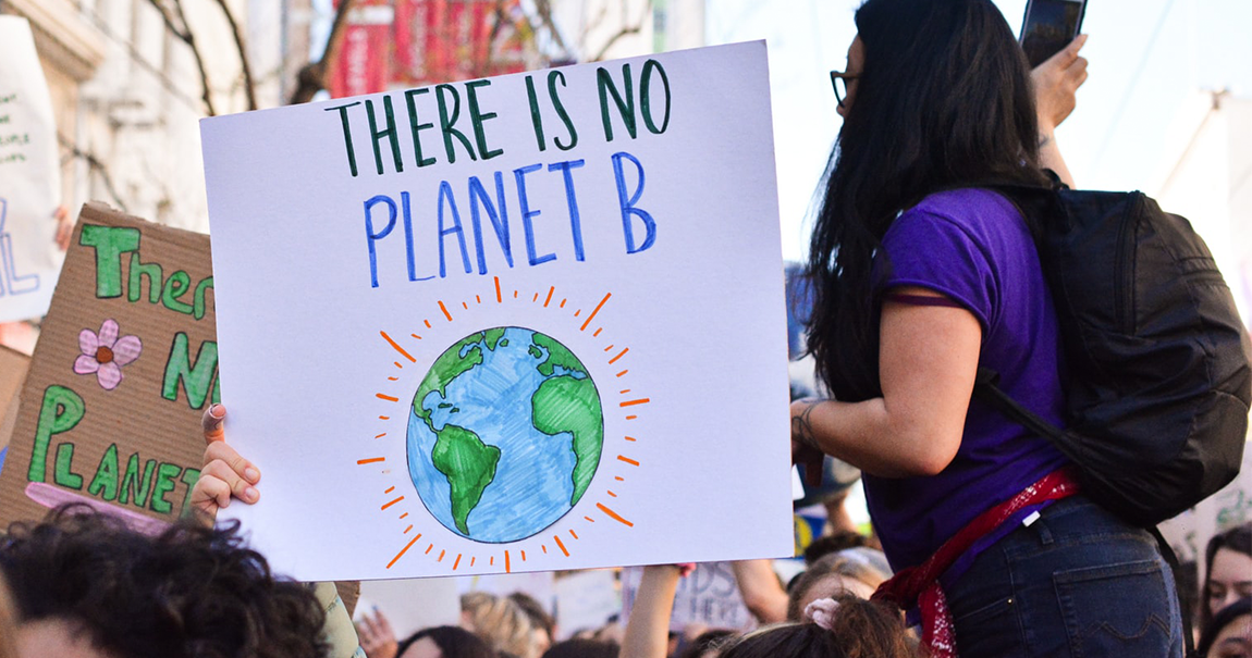 sign that says 'there is no planet B' - carried by students in a protest march