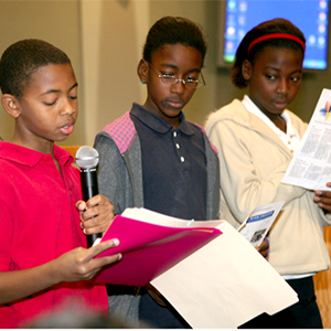 three young students presenting a PBL project