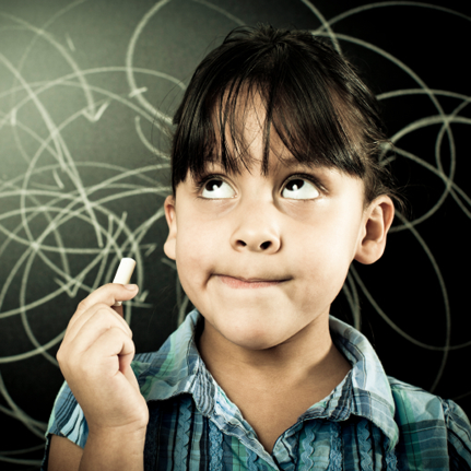 a student in front of a chalkboard with a piece of chalk in her hand. She is looking up and look to be thinking or remembering