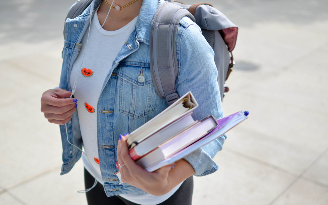 student with books