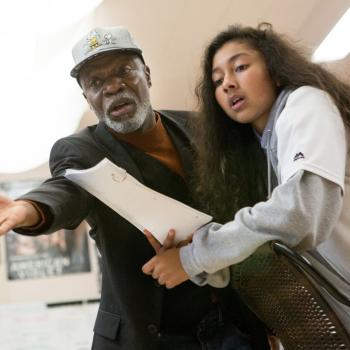 Teacher helping a student