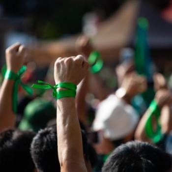 People raising fists in the air