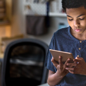 student doing homework on a tablet