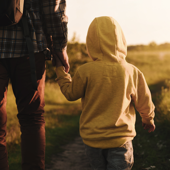 Father and son walking