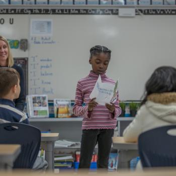 child presenting