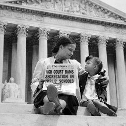 Nettie Hunt and her daughter Nickie sit on steps of the US Supreme Court building on May 18, 1954, the day following the Court's historic decision in Brown v. Board of Education