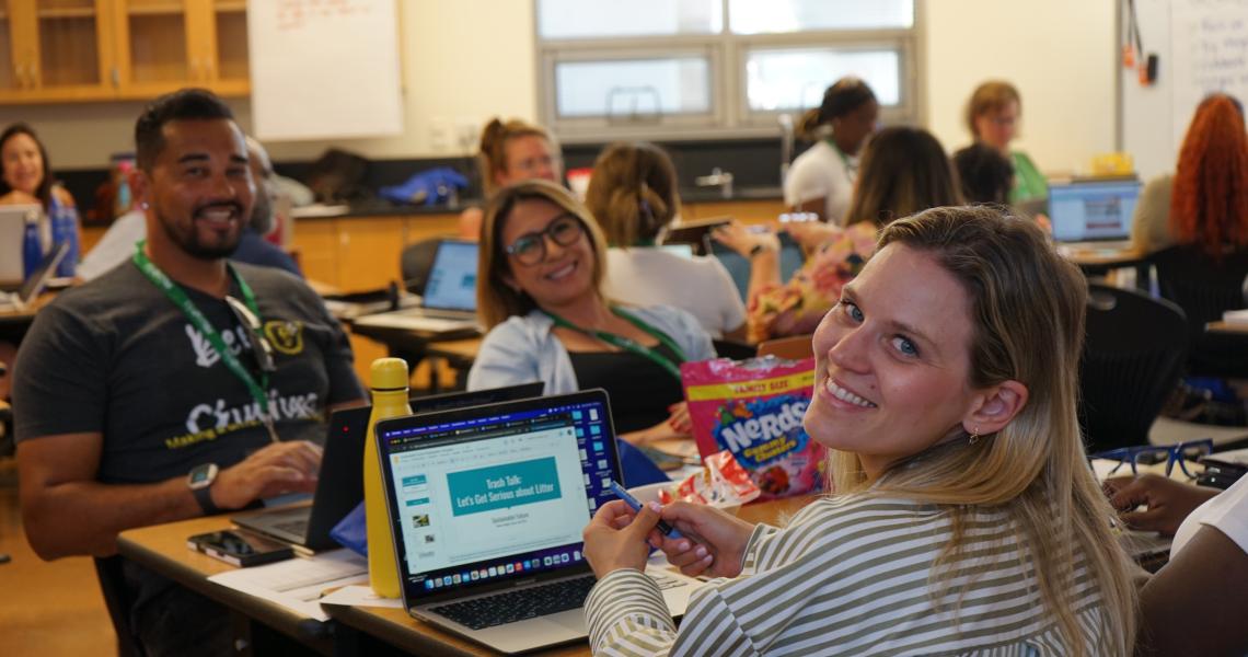 Happy group on computer