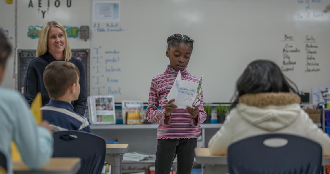 child presenting