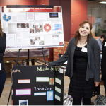 teachers in front of a project board