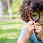 boy with a magnifier