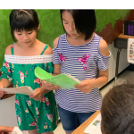 Students presenting a math project 