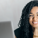 Woman at her laptop taking an online PBLWorks workshop