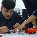 STEM student working on circuits