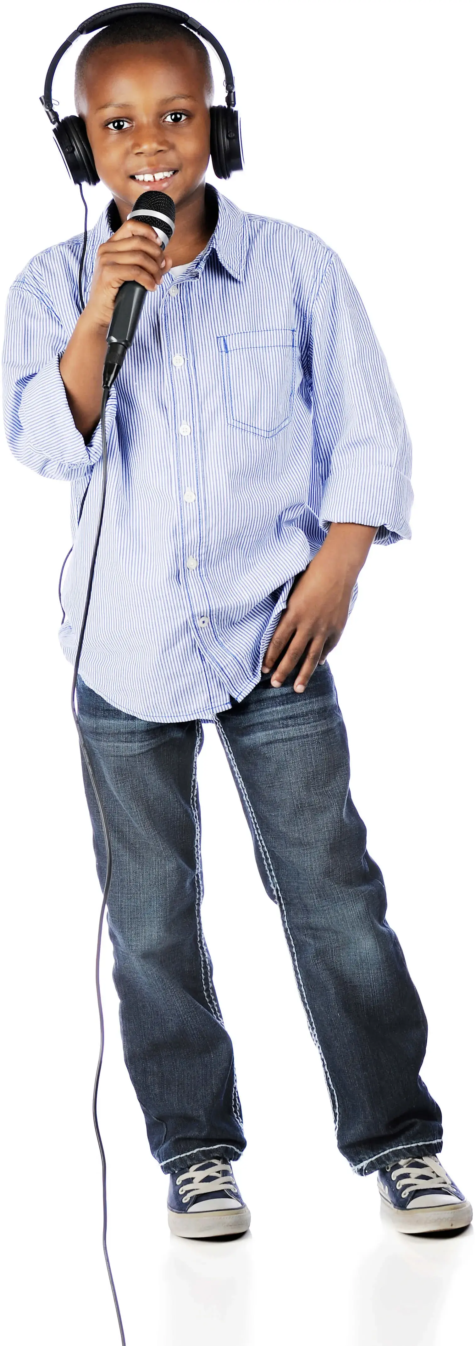 Young boy with headset on talking into microphone